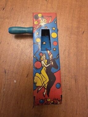 Vintage Yellow Turn Knob Tin Noise Maker Toy